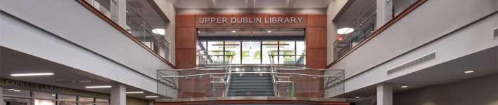 A photo of the second floor of the library taken from the lobby looking upwards